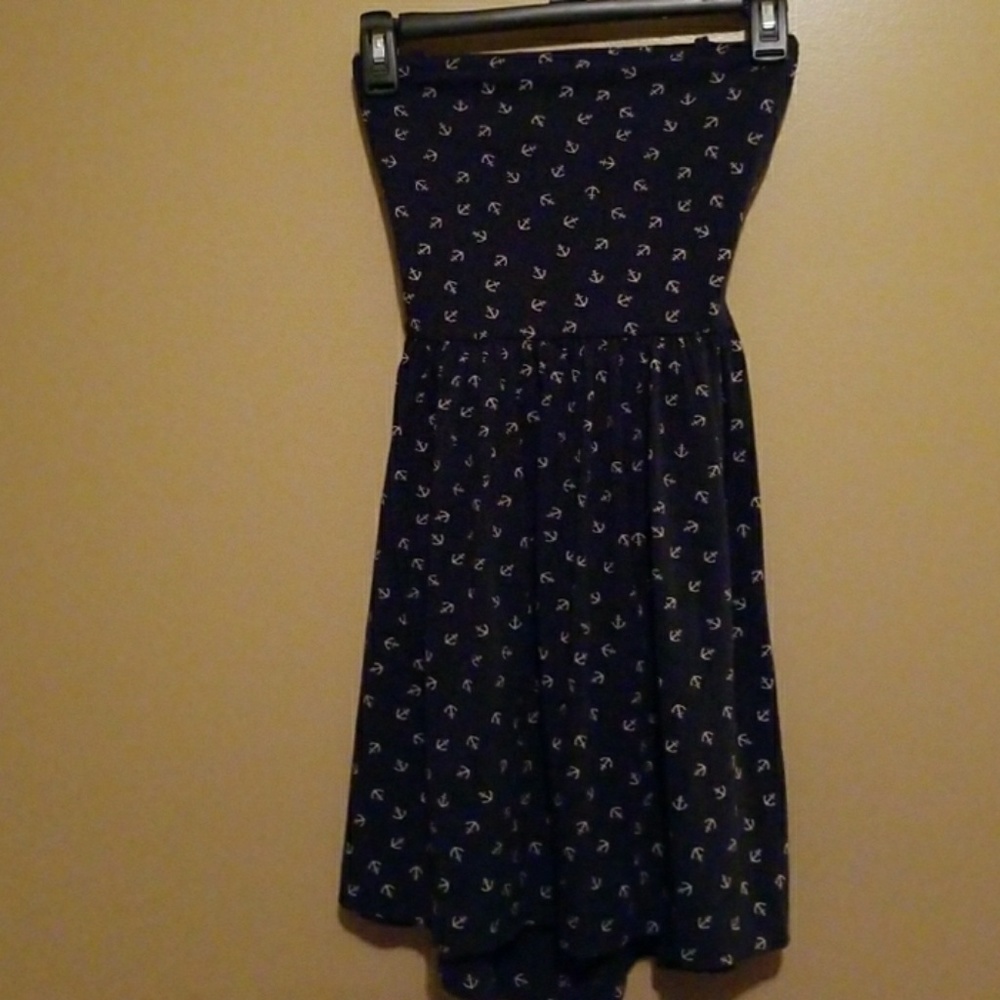 Dress with anchors with straps